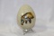 A Painted Stone Egg on Stand