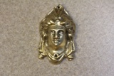 A Metal Head of a Lady