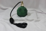 A Green Glass Parfume Bottle