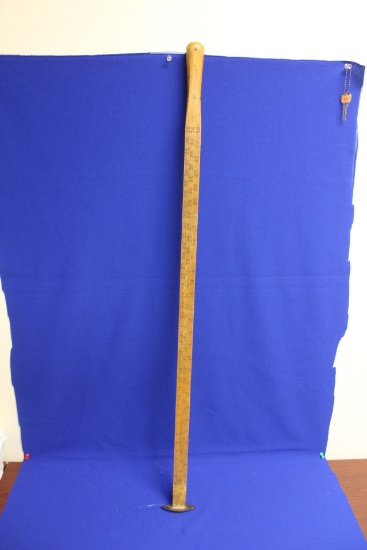 A Vintage Wooden Measuring Stick