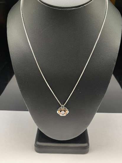 STERLING SILVER QUEEN CROWN JITTERBUG PENDANT FEATURING ROUND CUT CZ