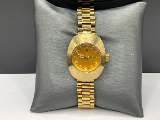 VINTAGR ADO DIASTAR WRISTWATCH FEATURING 11 ROUND CUT DIAMONDS SET AT EACH HOUR