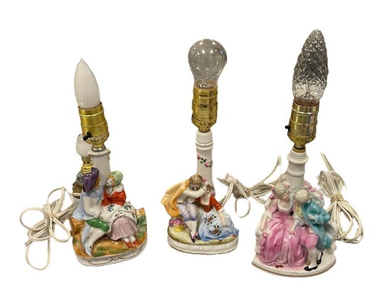 THREE HAND PAINTED PORCELAIN ROMANCE PROVINCIAL FIGURAL BOUDIER TABLE LAMPS, TWO ARE MADE IN GERM...