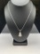 NAVAJO STERLING SILVER WHITE BUFFALO PENDANT ON STERLING SILVER SNAKE CHAIN NECKLACE