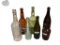 SEVEN ASSORTED ANTIQUE AND VINTAGE BOTTLES FOUR HAVE EMBOSSED LETTERING AMER PICON, BUFFALO BREWING
