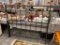 BRUSHED METAL QUEEN SIZE BED FRAME FEATURING TWISTED METAL DESIGN