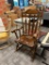 VINTAGE YUGOSLAVIAN MADE SOLID WOOD ROCKING CHAIR WITH HARVEST STENCIL AT TOP IN WINDSOR STYLE