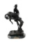 FREDERIC REMINGTON (1861-1909) RENOWN WESTERN ARTIST AND SCULPTOR BRONZE SULPTURE TITLED 