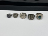 FOUR STERLING SILVER U.S. ARMY RINGS AND 1888 CALIFORNIA UNIVERSITY CLASS RING
