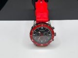 UNLISTED JAPANESE MOVEMENT WRISTWATCH WITH RED AND BLACK DESIGN