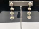 PAIR OF VINTAGE NAVAJO STERLING SILVER GRADUATED STAMPED CONCHO BALL DANGLE EARRINGS