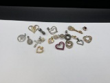 STERLING SILVER PENDANTS FEATURING VARIOUS DESIGNS AND SEVERAL HEART STYLES