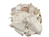 1981 GERBER BABY PORCELAIN DOLL IN WICKER BASKET WITH BEDDING