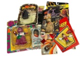 NEW IN PACKAGE ASSORTED VINTAGE TOYS, E.T. BARNEY, WCW RIC FLAIR, DISNEY MAX, AND OTHERS