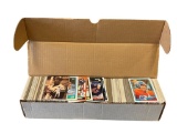 ASSORTED BASEBALL, BASKETBALL, HOCKEY, AND FOOTBALL SORTS CARDS FROM THE 1980'S AND 1990'S