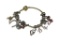 PANDORA DESIGNER GOLD TONE BRACELET WITH STERLING SILVER BEADS