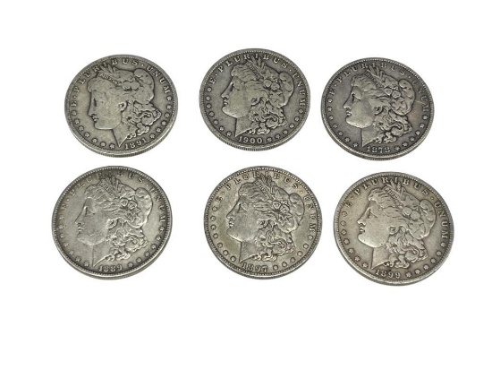 SIX ASSORTED U.S. MORGAN SILVER DOLLARS