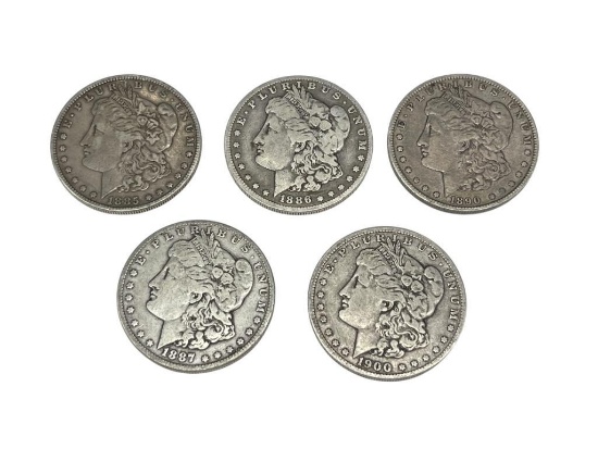 FIVE ASSORTED U.S. MORGAN SILVER DOLLARS