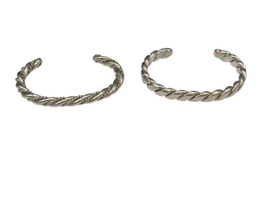 TWO SOLID STERLING SILVER TWISTED DESIGN CUFF BRACELETS