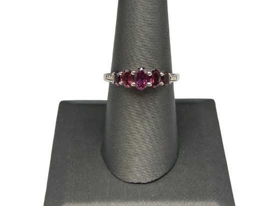 STERLING SILVER RHODOLITE GARNET RING FEATURING FIVE GRADUATED GARNETS