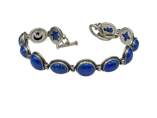 STERLING SILVER REVERSIBLE OVAL AND ROUND CUT LAPIS LINK BRACELET WITH SOUTHWEST DESIGN