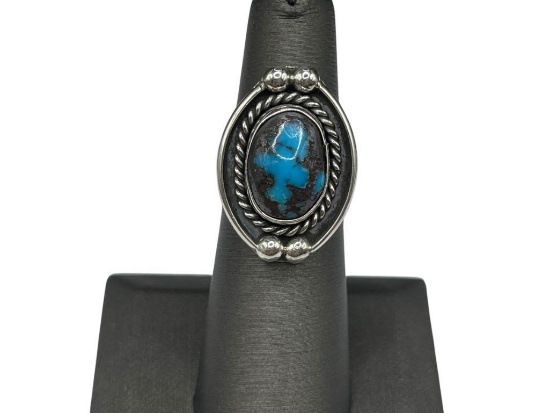 STERLING SILVER TURQUOISE RING FEATURING OVAL CABOCHON TURQUOISE