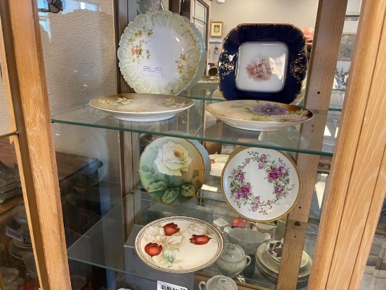 SEVEN ANTIQUE HAND PAINTED EUROPEAN PORCELAIN DINNER PLATES INCLUDING HAVILAND AND RS GERMANY