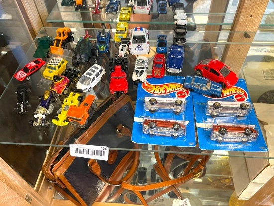 ASSORTED 1:64 DIE CAST MODELS CARS INCLUDING TWO UNOPENED HOT WHEELS FATHER & SON MUSTANG PACKAGES