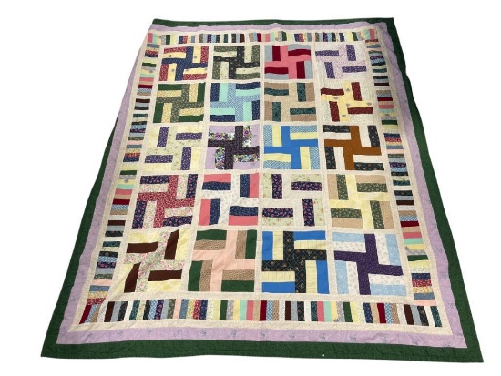 VINTAGE HAND MADE PATCHWORK QUILT FEATURING GEOMETRIC SHAPES AND SMALL FLOWER QUILT
