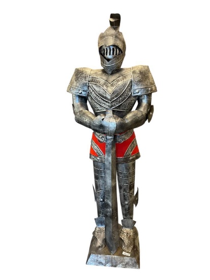 LIFE SIZED METAL STATUE OF MIDEIVAL KNIGHT IN SUIT OF ARMOR WITH RED FELT ACCENTS