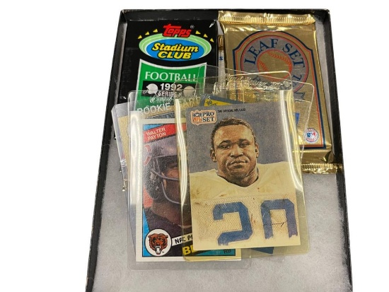 FIVE SEALED SPORT CARD PACKS AND FOUR LOOSE SUPERSTAR PLAYER CARDS WALTER PEYTON, DEION SANDERS