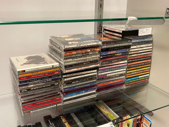 APPROX. 70 ASSORTED MUSIC CD'S IN ORIGINAL CASES