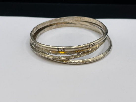 FOUR VINTAGE BANGLE BRACELET WITH STAMPED DESIGNS