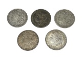 FIVE ASSORTED U.S. MORGAN SILVER DOLLARS