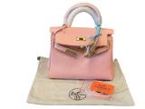 MARKED HERMES PINK CONSTANCE EPSON DESIGNER BAG WITH DUST COVER, SHOULDER STRAP, AND HORSE CHARM