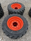 Set of 4 new 10-16.5 Skid Steer Tires on Bobcat Wheels