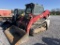 Takeuchi  TL10V2 skid steer showing 2500 hrs