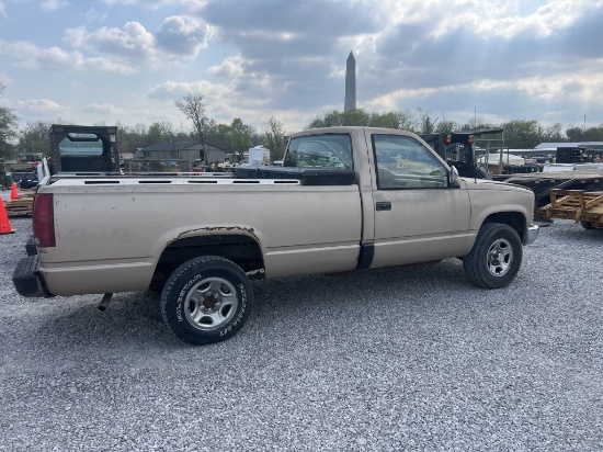 Chevrolet truck showing 242,099 miles