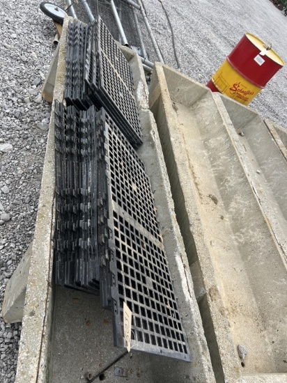 Two stacks of plastic mats