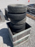 Bin of 8x 5 lug farm machinery tires 23.5x8.0R12
