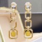 14k Gold 0.91 Ctw Natural Yellow Diamond & Diamond Earrings