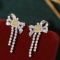 14k Gold 0.86 Ctw Natural Yellow Diamond & Diamond Earrings