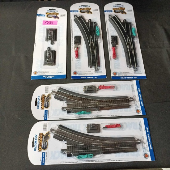 4 packs of remote turnouts and a pair of Hayes bumpers for model train collection