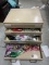 metal organizer filled with party supplies