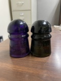 Lot of 2 glass insulators , olive green and purple