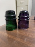 Lot of 2 glass insulators , olive green and purple W.G.M. Co