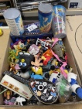 Box of assorted toys and cups