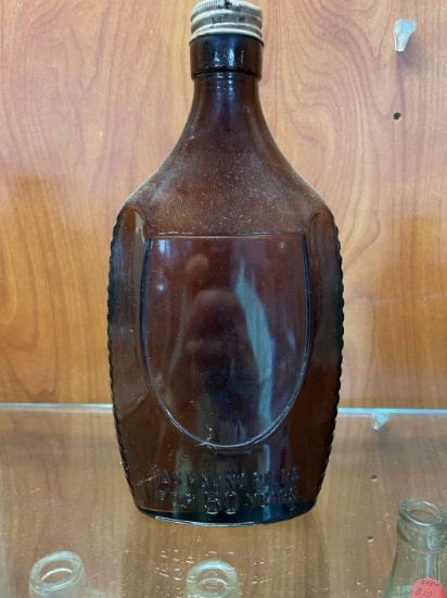 Amber Glass Whiskey Flask“ Has Had No Peers for 50 Years