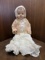 Antique Baby Doll in White Gown and Sweater