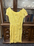 un-marked yellow polkadot dress with belt
